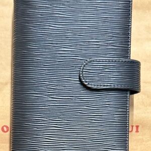 Black, textured A6 binder perfect for cash stuffing